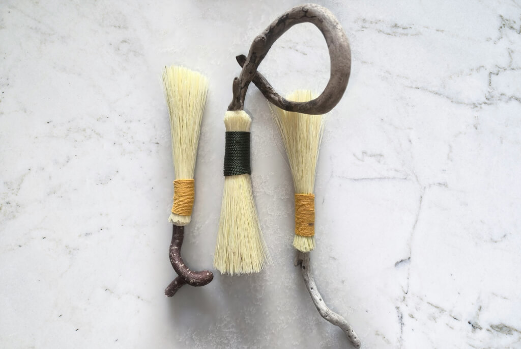 Folk art handcrafted, hand-held brushes