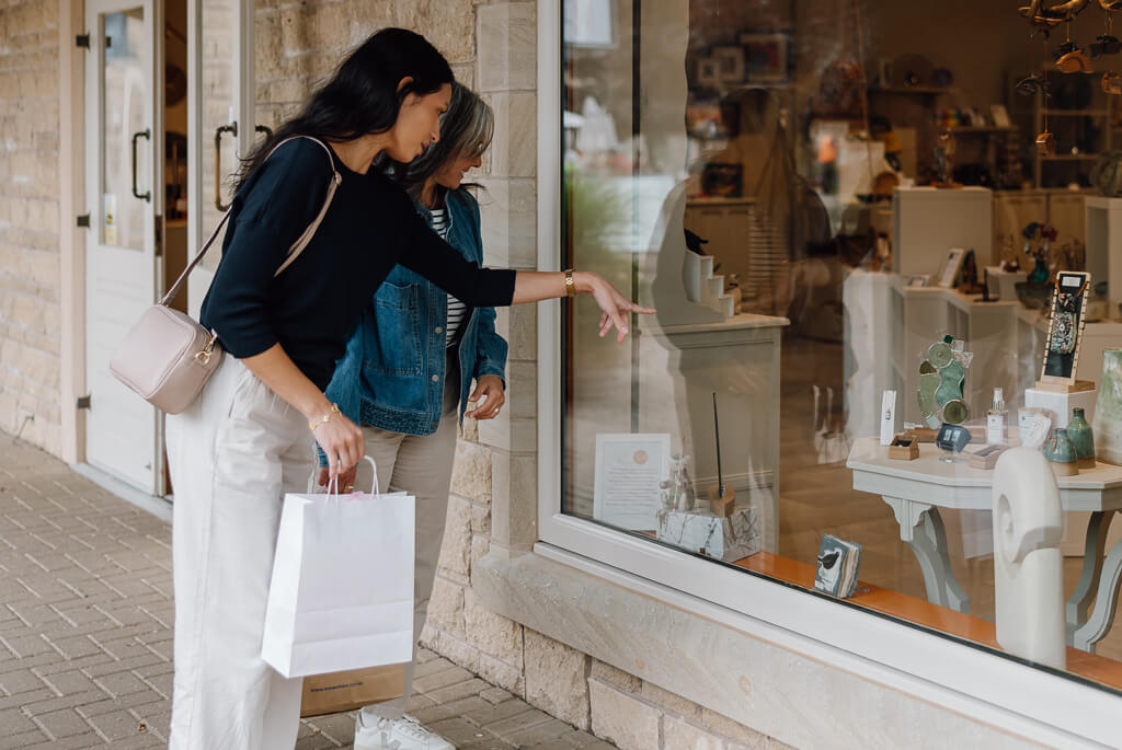 Two women window shopping